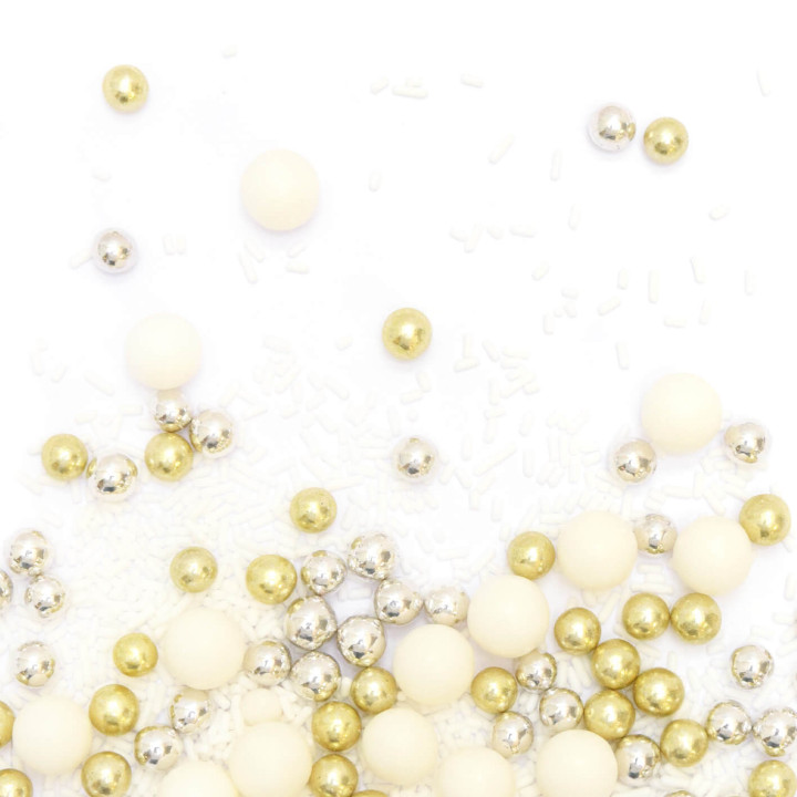 Décor à parsemer : mélange de décors sucrés blancs, dorés et argentés