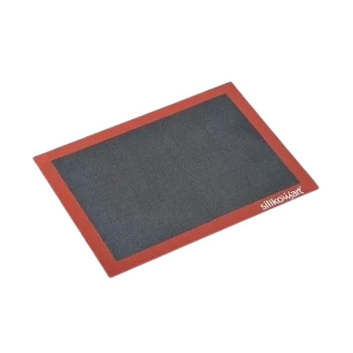 Tapis de cuisson ajourée en silicone noir et rouge Air mat - Silikomart