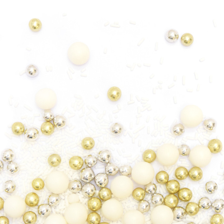 Décor à parsemer : mélange de décors sucrés blancs, dorés et