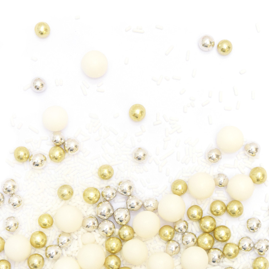 Décor à parsemer : mélange de décors sucrés blancs, dorés et