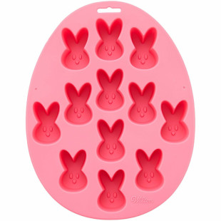 Moule en silicone 12 petits lapins de Pâques 4.5 cm - Wilton Moule en silicone 12 petits lapins de Pâques 4.5 cm - Wilton