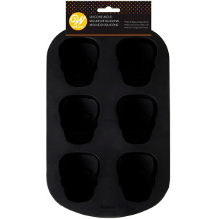 Moule en silicone 6 Crânes d´Halloween - Wilton Moule en silicone 6 Crânes d´Halloween - Wilton